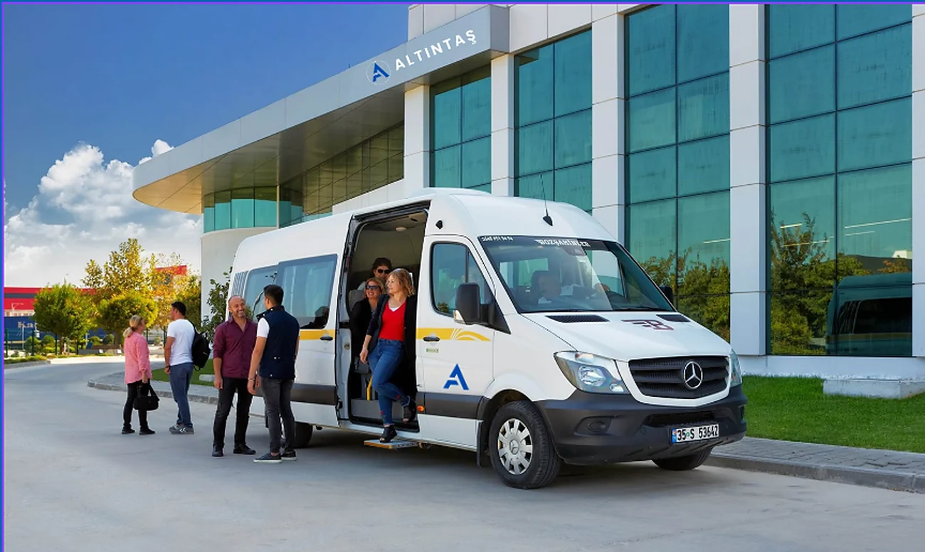 Employees boarding a shuttle